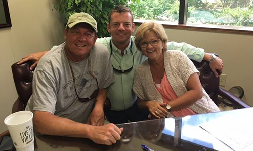 The Parkers with Ryan Boone at the closing of their new ITB home purchase